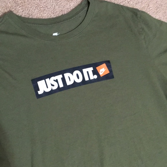 olive green and orange nike shirt